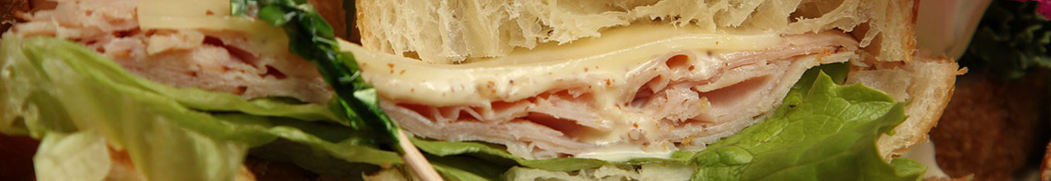 Eating Pizza Sandwich Salad at Nik & Charlie's Pizzeria restaurant in Greenland, NH.